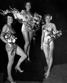 Miss Vancouver contestants posing with flowers