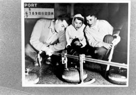 Three people curling
