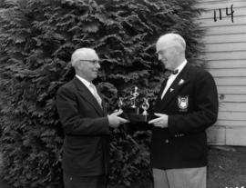 Bellingham Mayor S. Hjaltalin and P.N.E. President J.S.C. Moffitt with trophy