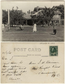 [Young women playing tennis on lawn]