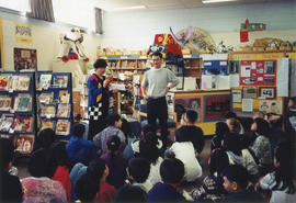Paul Yee with students and a staff member at Dundas Elementary School, Toronto