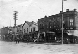 Street Scene in Vancouver showing block of shops at 432 Westminster Avenue (Main Street)