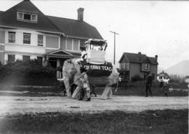 [An imitation elephant to promote Columbo Tea and Company in a parade in front of 579 Burrard Str...