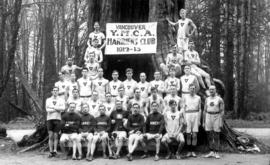 Vancouver Y.M.C.A. Harriers Club 1912-1913 [posing at the Hollow Tree in Stanley Park]