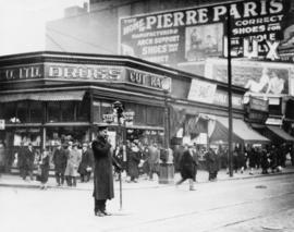 [Police Constable Duncan McTavish on traffic duty at Abbott and Hastings Streets]