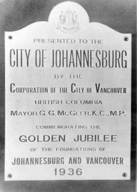 [The plaque commemorating the gift of a flagpole from the City of Vancouver to the City of Johann...