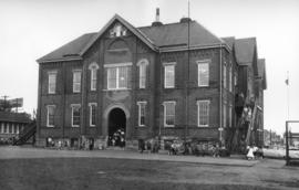 [Students and teachers evacuate Mount Pleasant School during a fire drill]