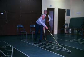 [Seniors playing shuffleboard]