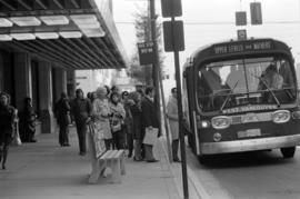 Commuters board a bus near W. Georgia and Seymour Streets