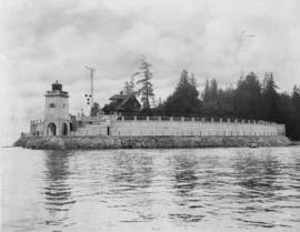 Brockton Point Lighthouse with residence behind at Stanley Park