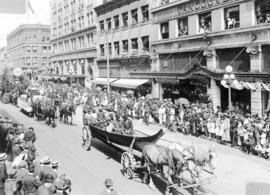 [A parade in the 700 Block of Granville Street]