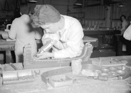 [Miss Joan Blakeway at work at the Boeing aircraft plant on Georgia Street]