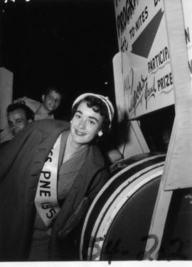 Nancy Hansen, Miss P.N.E., drawing ticket for P.N.E. program prize