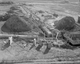 Working on junction of #1 and tail flume at beet pumphouse