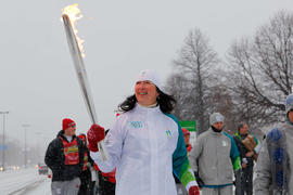 Day 41 Torchbearer 1 Tricia Smith is carrying the flame in Montreal, Quebec