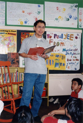 Paul Yee reading at Macdonald Elementary School, Vancouver, during Vancouver International Writer...
