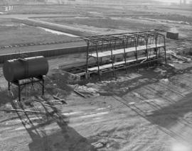 Diesel oil tank storage erected at left and completed