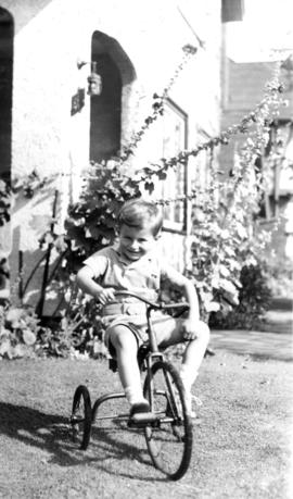 John [Banfield on a bike at 5575 Angus Avenue]