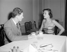 [Lena Horne having coffee with a man]