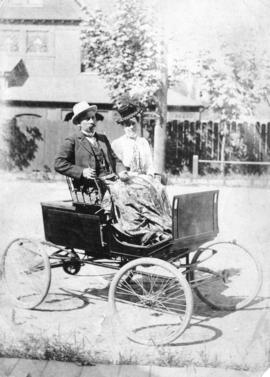 [Mr. and Mrs. George M. Taylor in a steam-driven car]