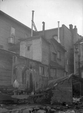 [Exterior view of the rear of 437 Powell Street, closed by the Health Department]