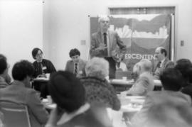 Hayne Wai, Robert Dubberley, unidentified man and Mike Harcourt at front of multicultural meeting