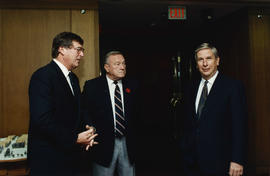 Three unidentified men at civic recognition ceremony