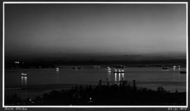 Dock strike [15 ships in harbour at night]