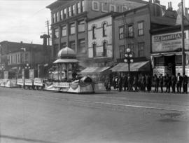 [A Kelly Douglas and Company float in a wartime parade in the 100 Block of East Hastings Street]