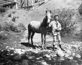 B.T. [Benjamin Tingley] Rogers in Calif. [California] with horse