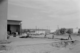 [View of street and warehouses near Hudson Street and 73rd Ave]