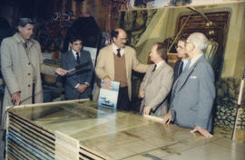 Mike Harcourt, Ferdinand Petrov, unidentified man and Fraser Wilson being interviewed in front of...