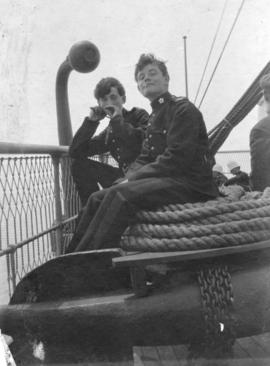 [18th Field Ambulance, Canadian Army Medical Corps' buglers relax on board ship]