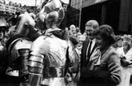 Group of people with actors dressed in knight costumes outside of Castle Vancouver