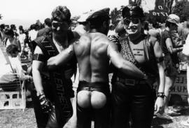 Portrait of three people wearing leather at outdoor event