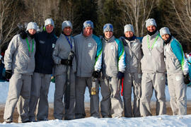 Day 67 Security runners and Flame Attendants posing for a crew picture in Kakabeka Falls, Ontario