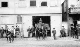 [Firemen and wagons outside Fire hall No. 1 on Water Street]