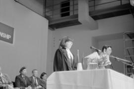 Judge Angela Kan presiding at a Canadian citizenship ceremony
