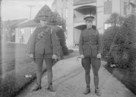 [Two soldiers in uniform]