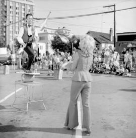 [A preview of the] International Circus [in the Shoppers Drug Mart parking lot in Kerrisdale]