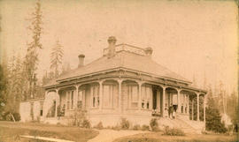 [Benjamin B. Springer and family on the front steps of their residence]