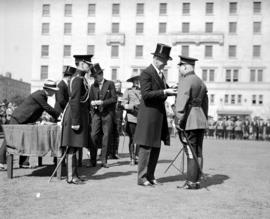 Governor General Bessborough presenting medals at Courthouse