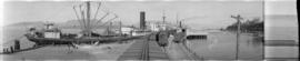 [View of Terminal Dock showing a ship and railway tracks and cars]