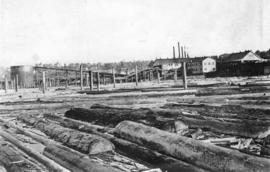 [View of Rat Portage Lumber Company from the C.P.R. Trestle Bridge]