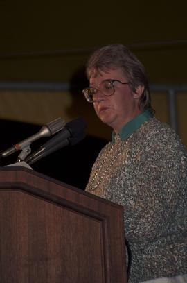 Joy Leach speaking at the lighting of the Peace Flame Monument ceremony