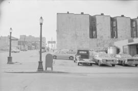 [Cars in parking lot at Main Street and Alexander Street, 3 of 5]