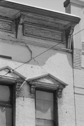 [Detail view of windows and cornices at 210 Carrall Street - Abrams Block]