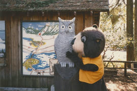 Tillicum with carving of owl at Capilano Suspension Bridge Park