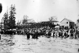 [Woman being led out of English Bay by the Reverends Christmas and Fair]