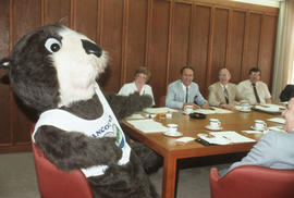 Tillicum at table with Centennial Committee members at Vancouver City Hall